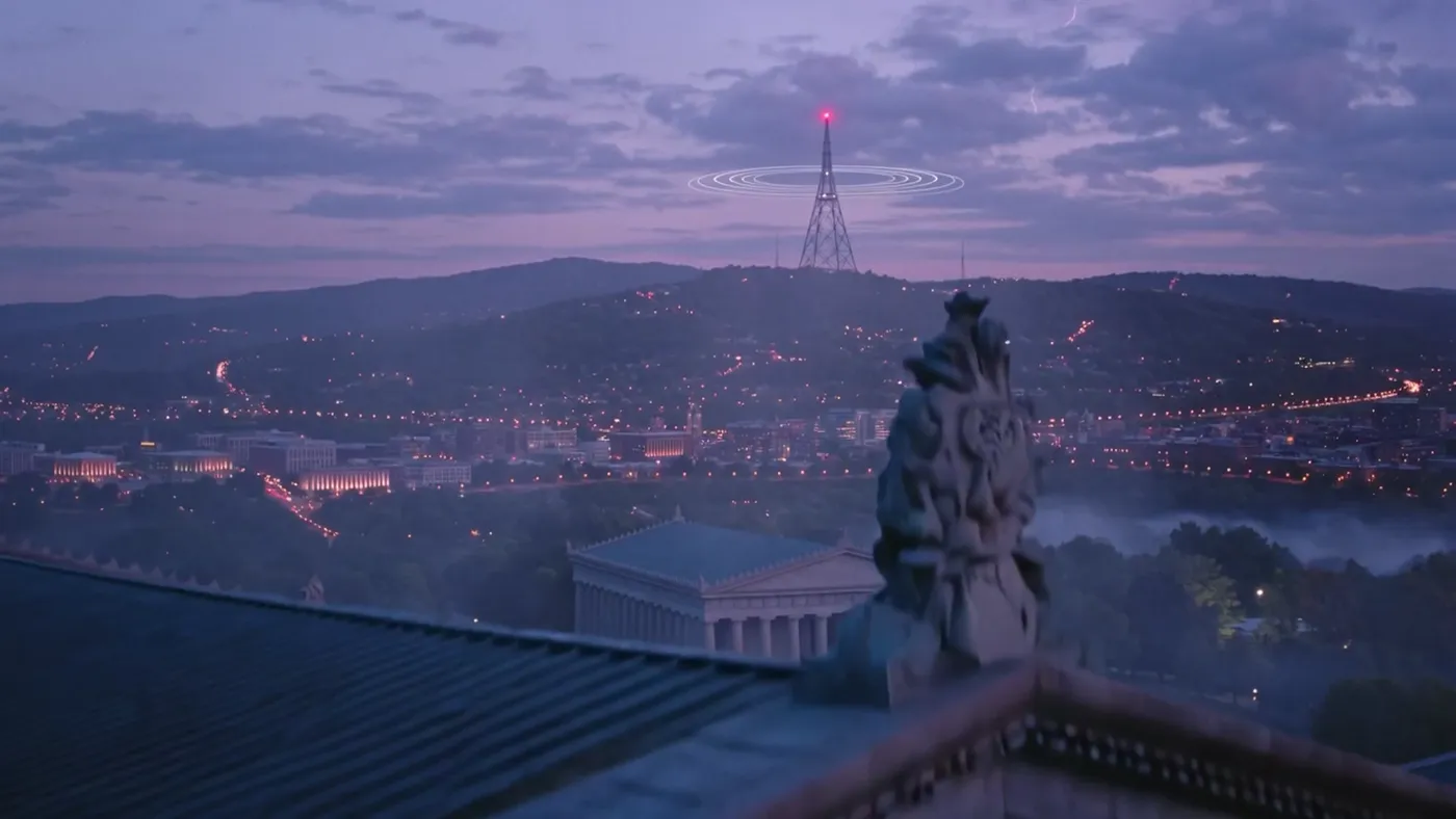 Nashville at dusk with a transmission tower on the skyline